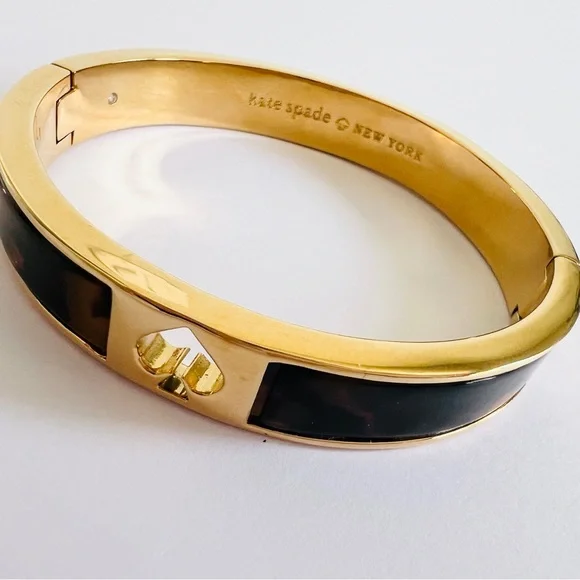 KATE SPADE Hole Punch Spade Bangle Snap Closure Tortoise Gold-Tone Bracelet OS - Picture 7 of 9